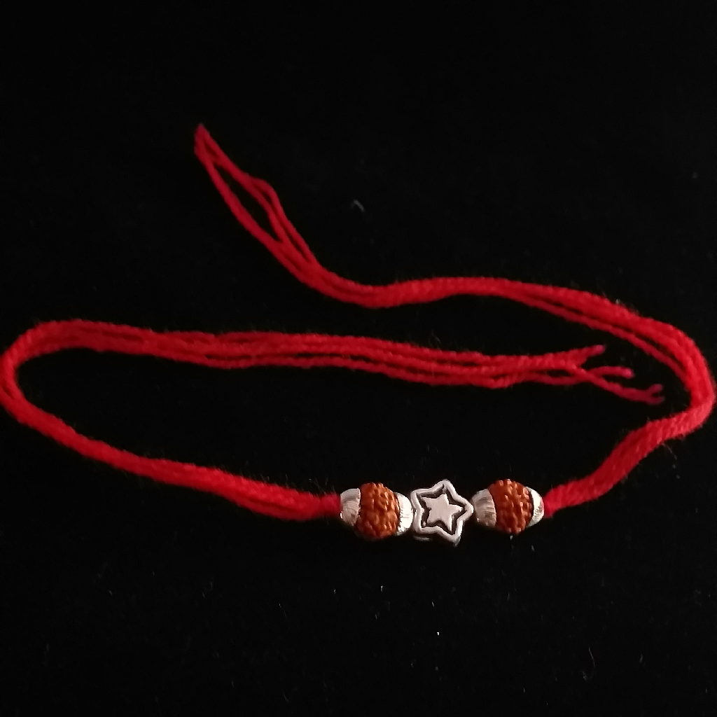 Silver Vertical rudraksh & star Broach rakhi