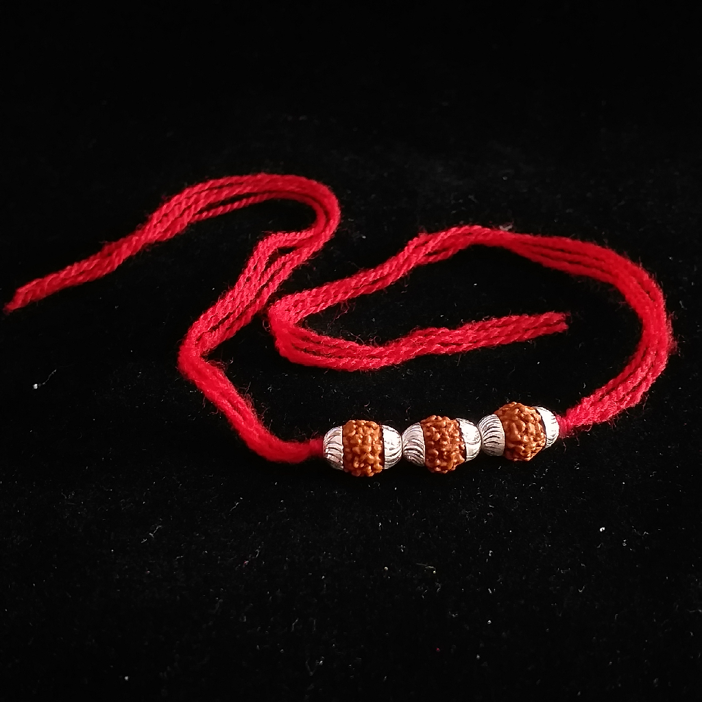 Silver Vertical three rudraksh rakhi
