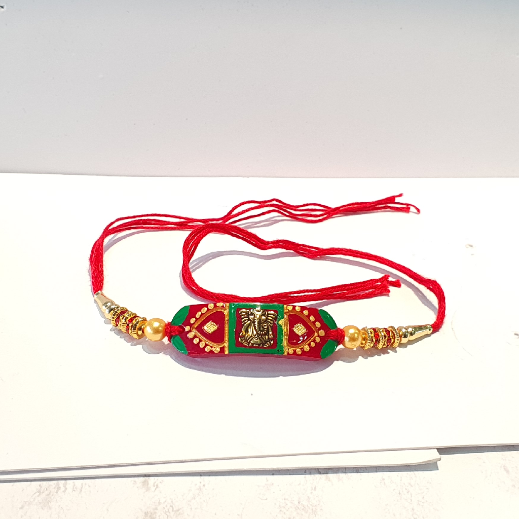 Gold rakhi for ganpati design