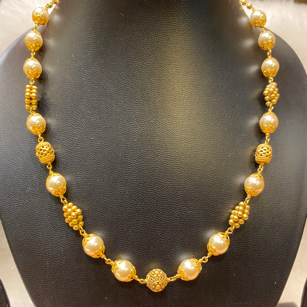 Antique mala with tops