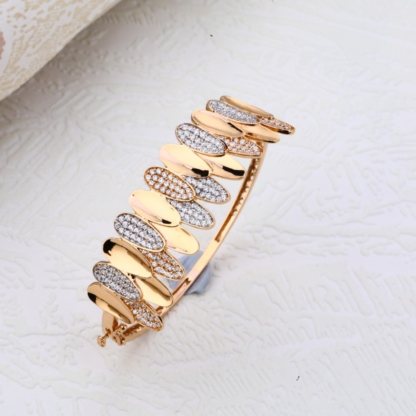 18kt rose beautiful unique hallmark design Bangle