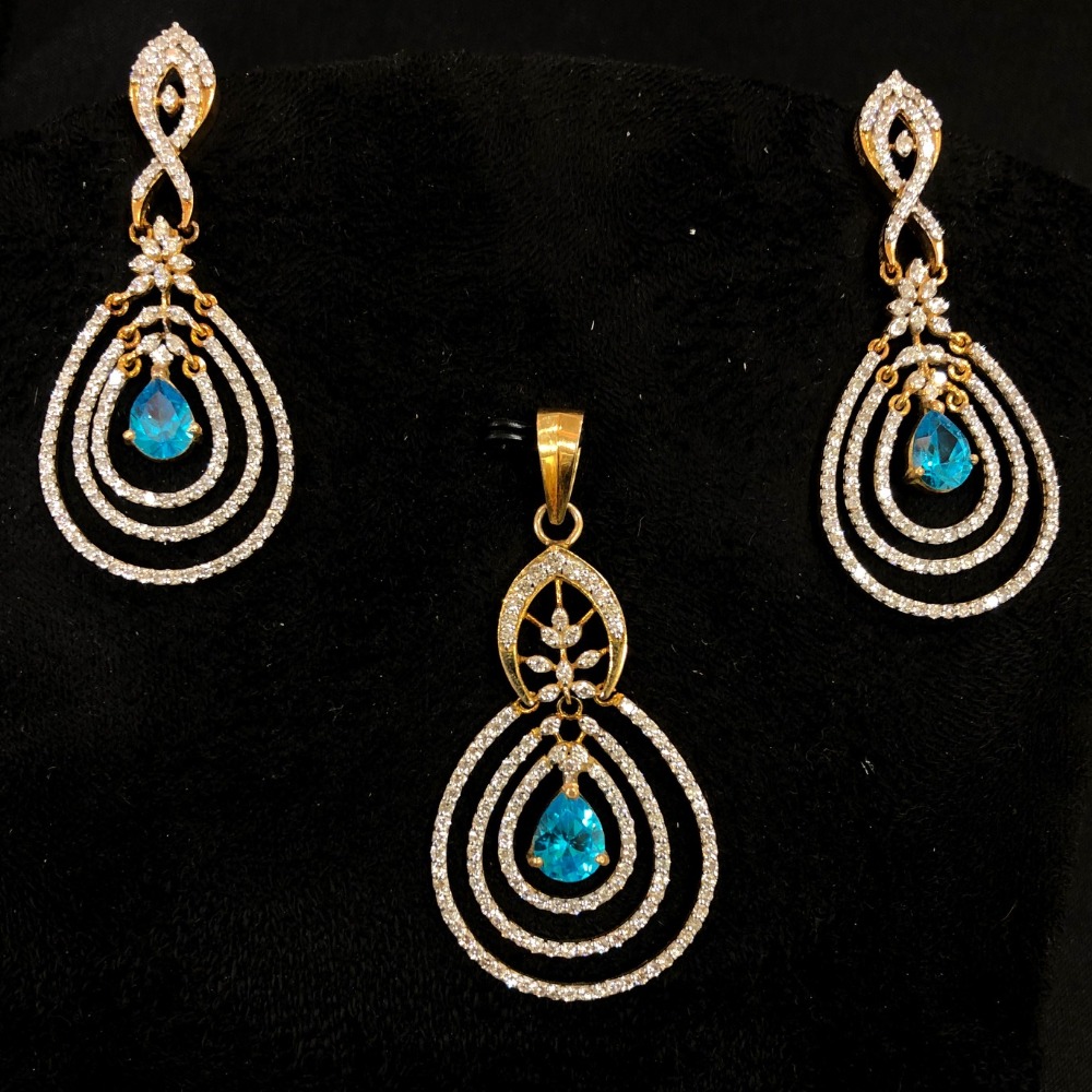 Attractive blue stone diamond pendant set