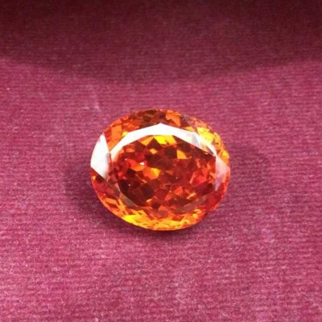 12-23ct oval orange ruby-manek