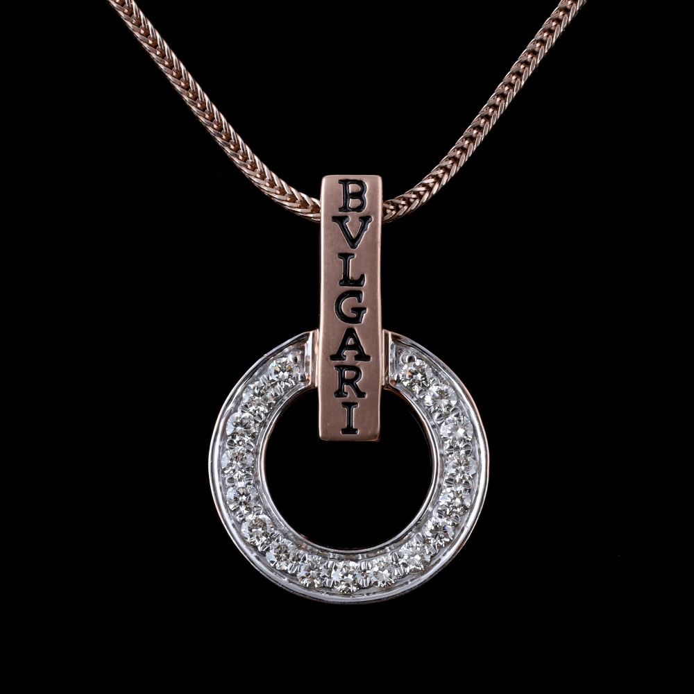18kt bvlgari shaped diamond pendant