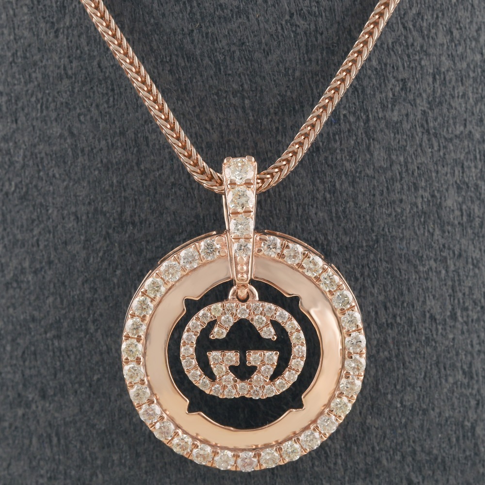 18kt gucci shaped rose gold  diamond pendant