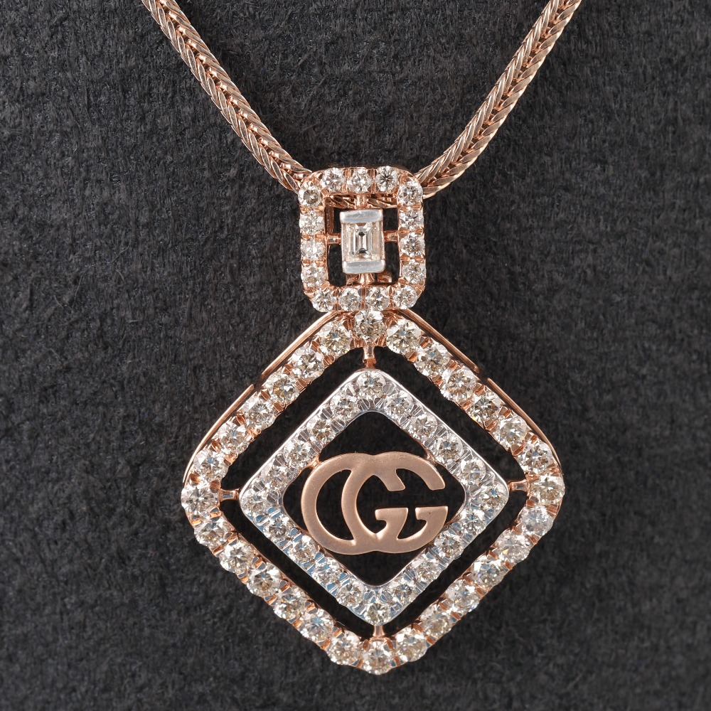 18kt gucci shaped diamond pendant