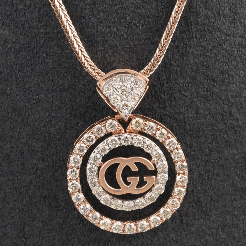 18kt Gucci shaped diamond pendant
