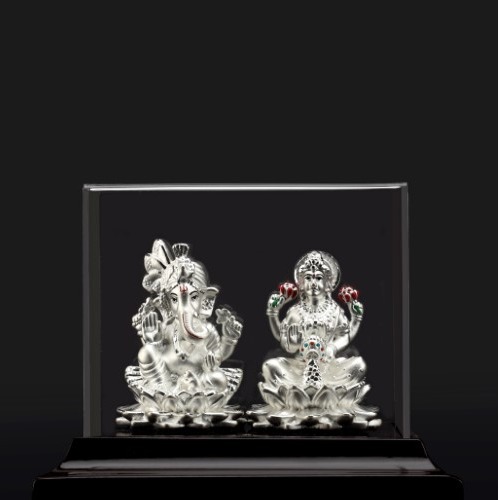 silver ganpati and laxmi  murti