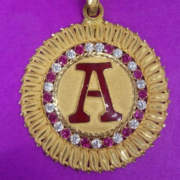 22kt gold fancy name with diamond pendant