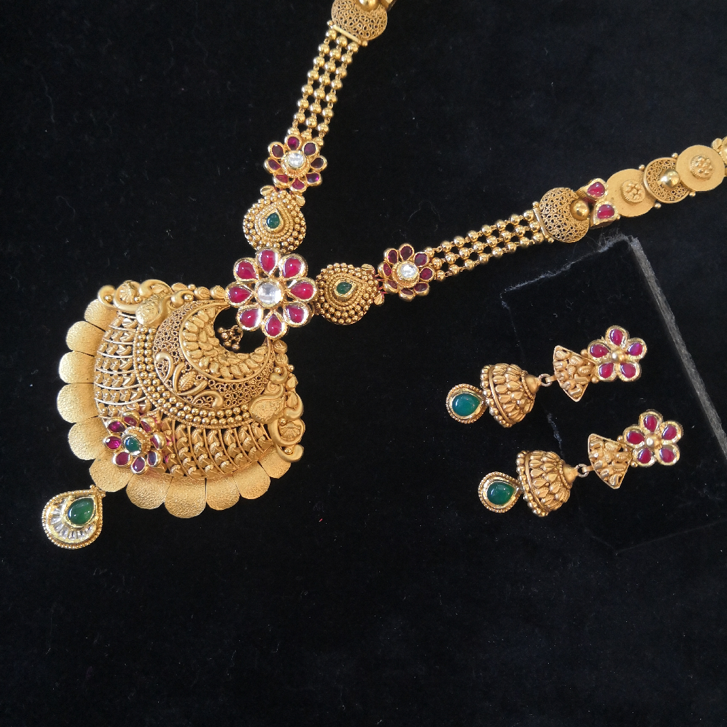 22k gold fancy antique jadtar rajvadi long set