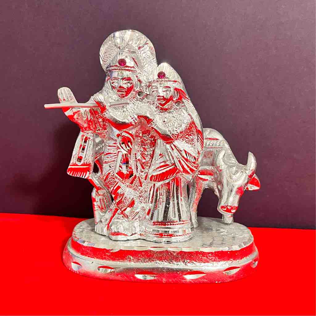 silver plated radhe Krishna and cow idol