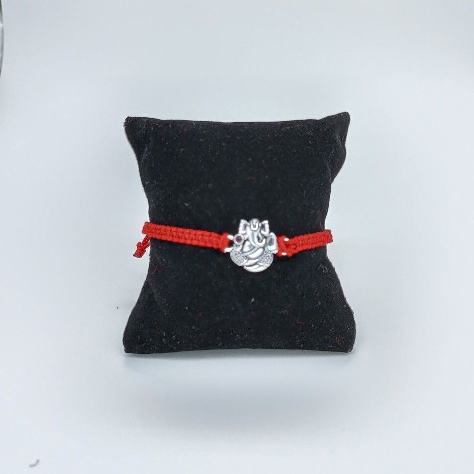 Ganesh ji design in silver rakhi