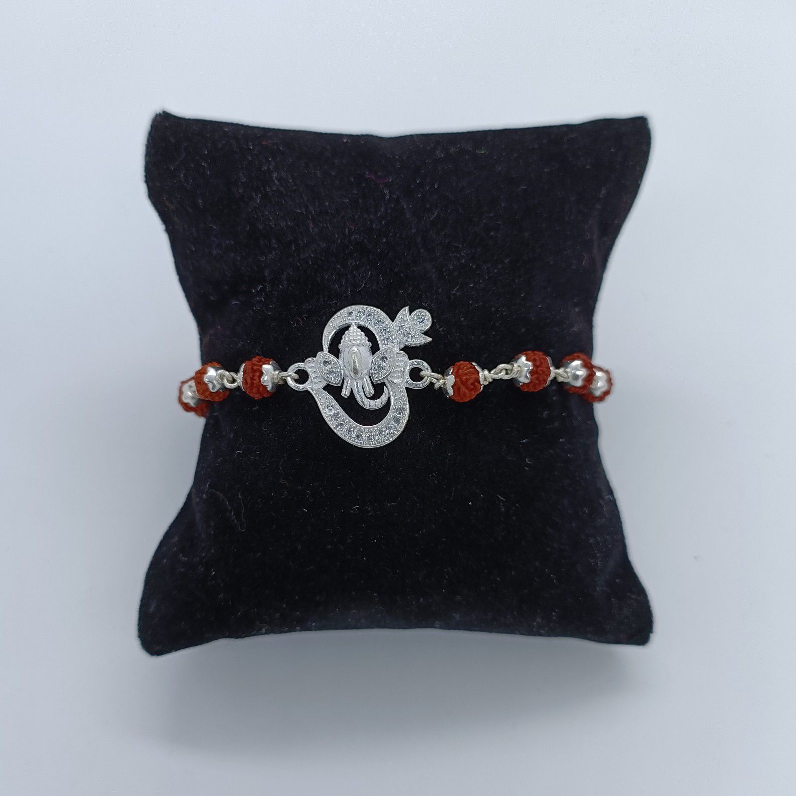 Ganpati Design In Silver Rudraksh Rakhi