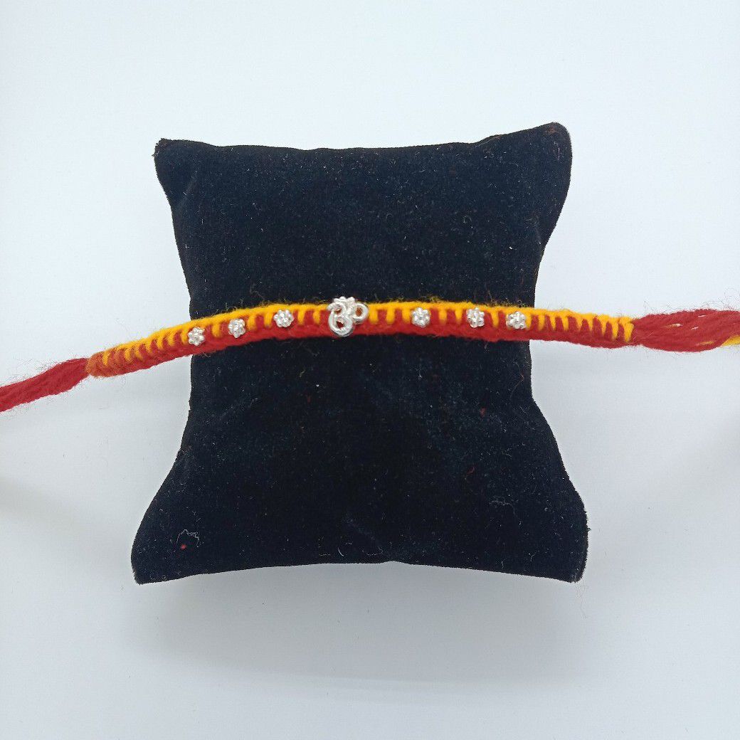 800 silver om design rakhi