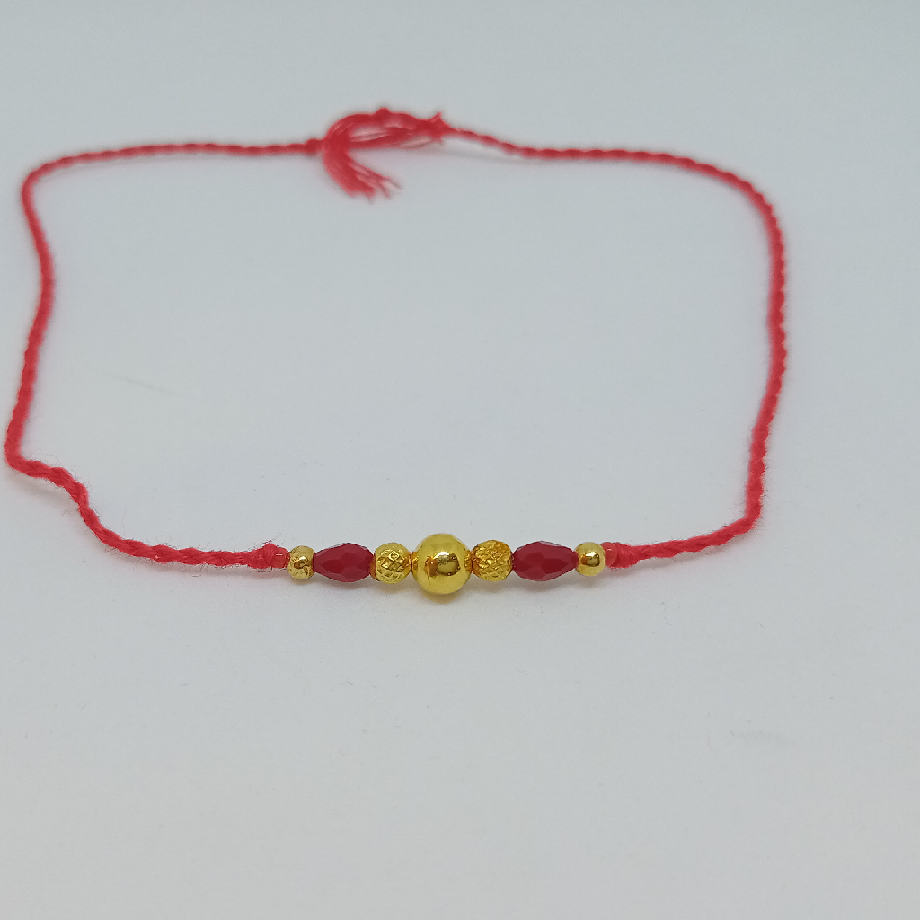 Gold plain Rakhi of pearls