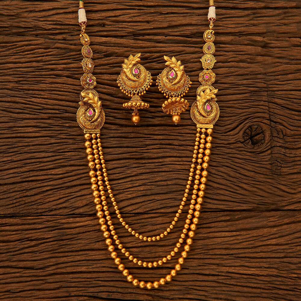Gold mala type necklace
