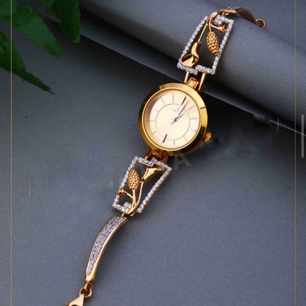18KT Yellow Gold fancy round dial watch for Ladies