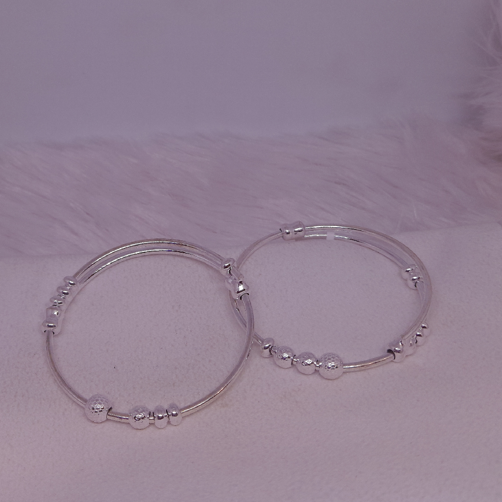 silver bol and simple baby's kada