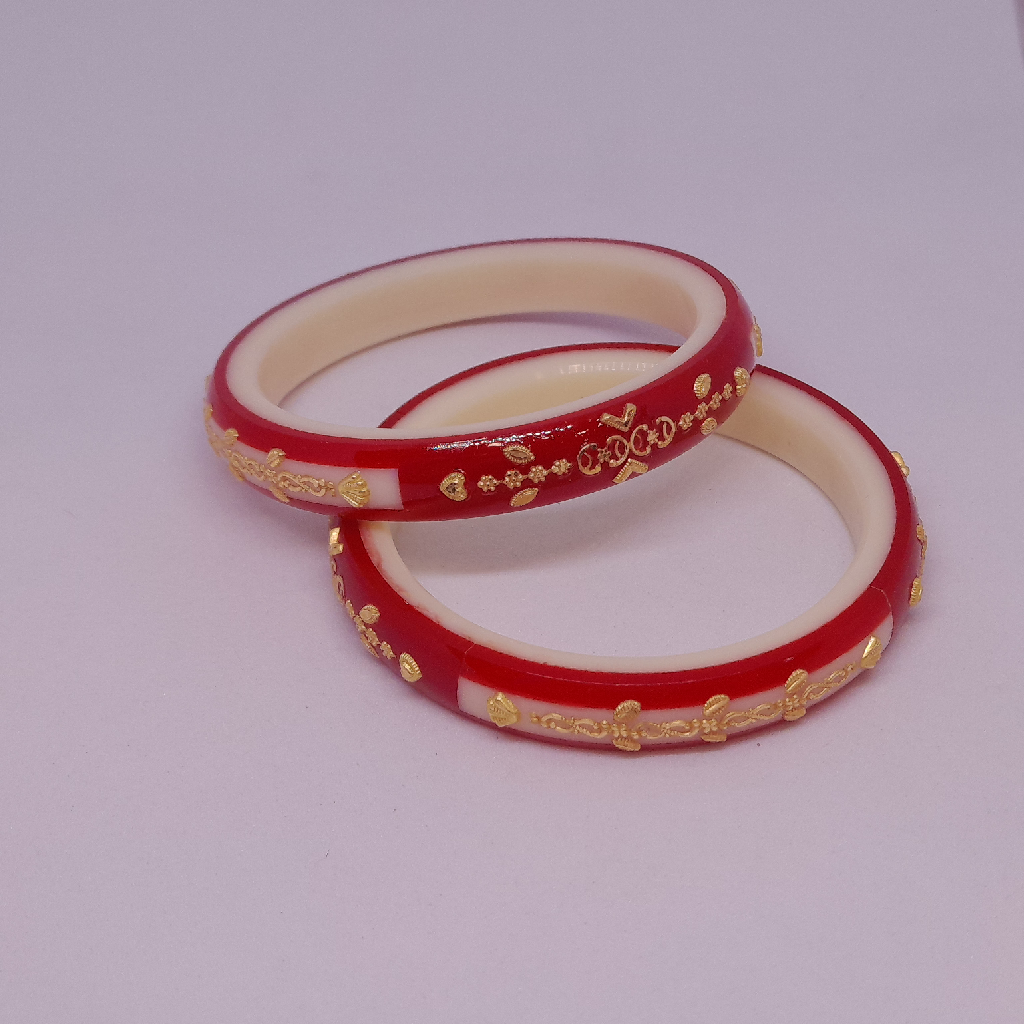 red and white plastic bangles