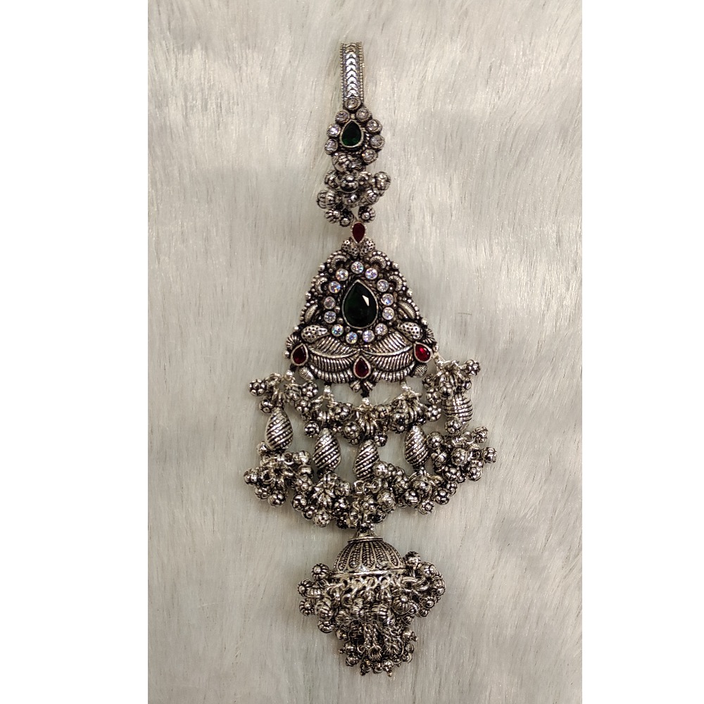 Silver oxidizes with green stone judo