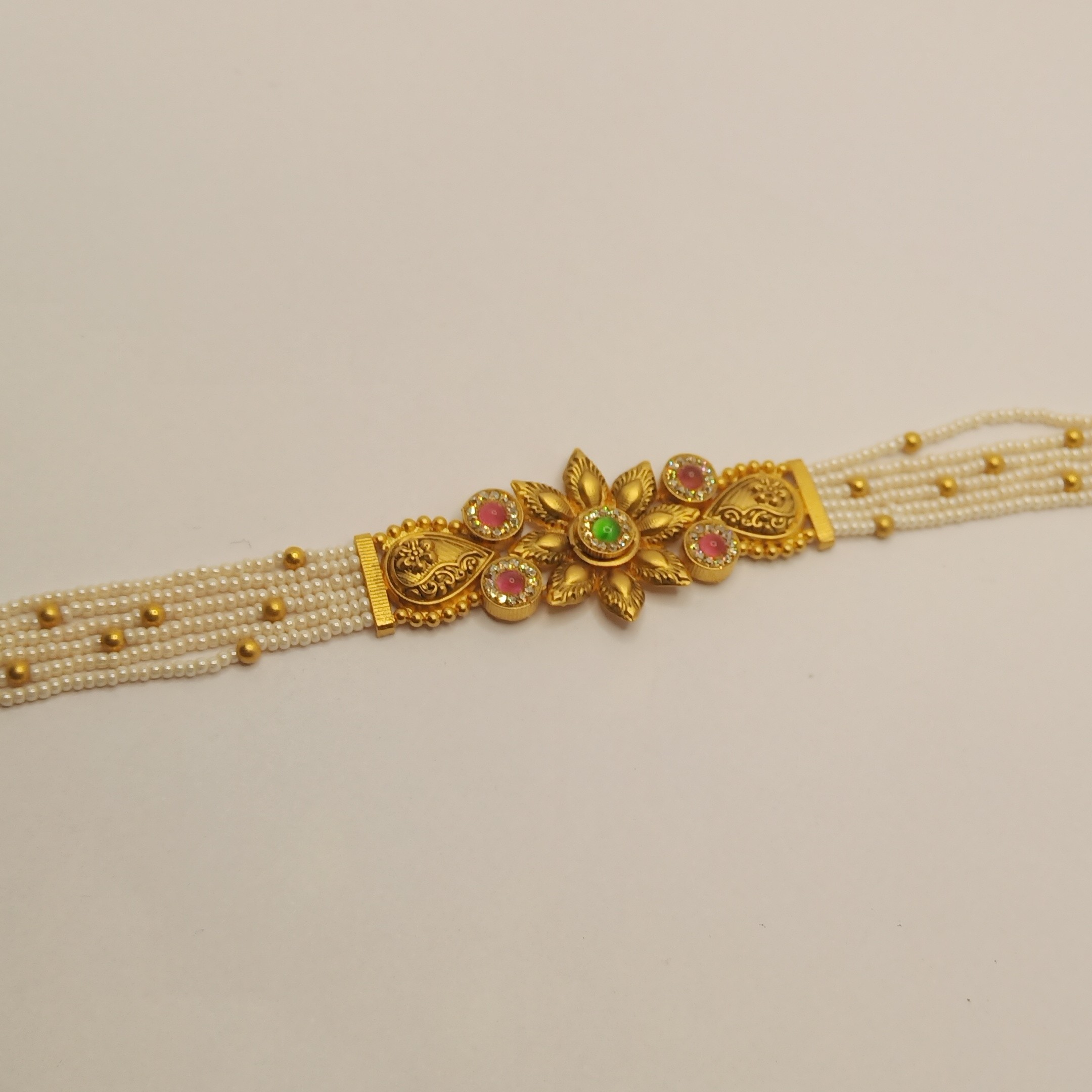 916 gold kundan with white moti bracelet for women