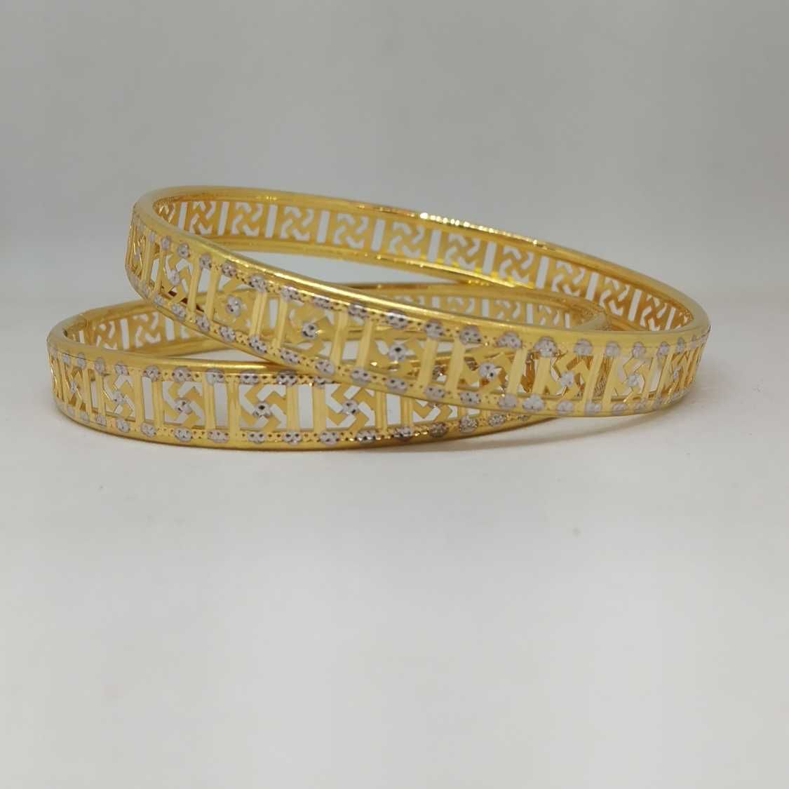 22 KT GOLD SVASTIK DESIGNED COPPER BANGLE