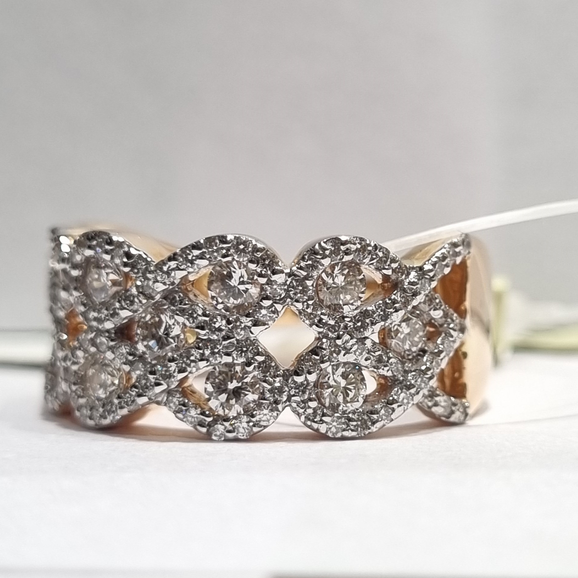 heacy mat pattern with scattered diamond ring