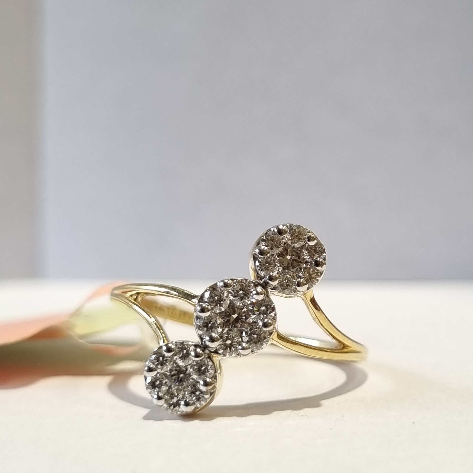 triple pressure solitaire ring