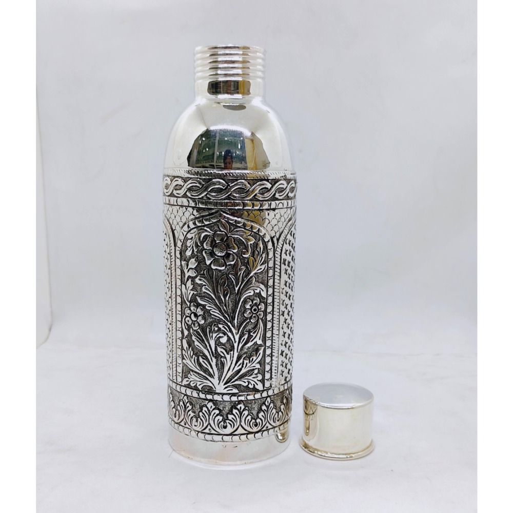 Hallmarked silver bottle in fine antique temple design carving
