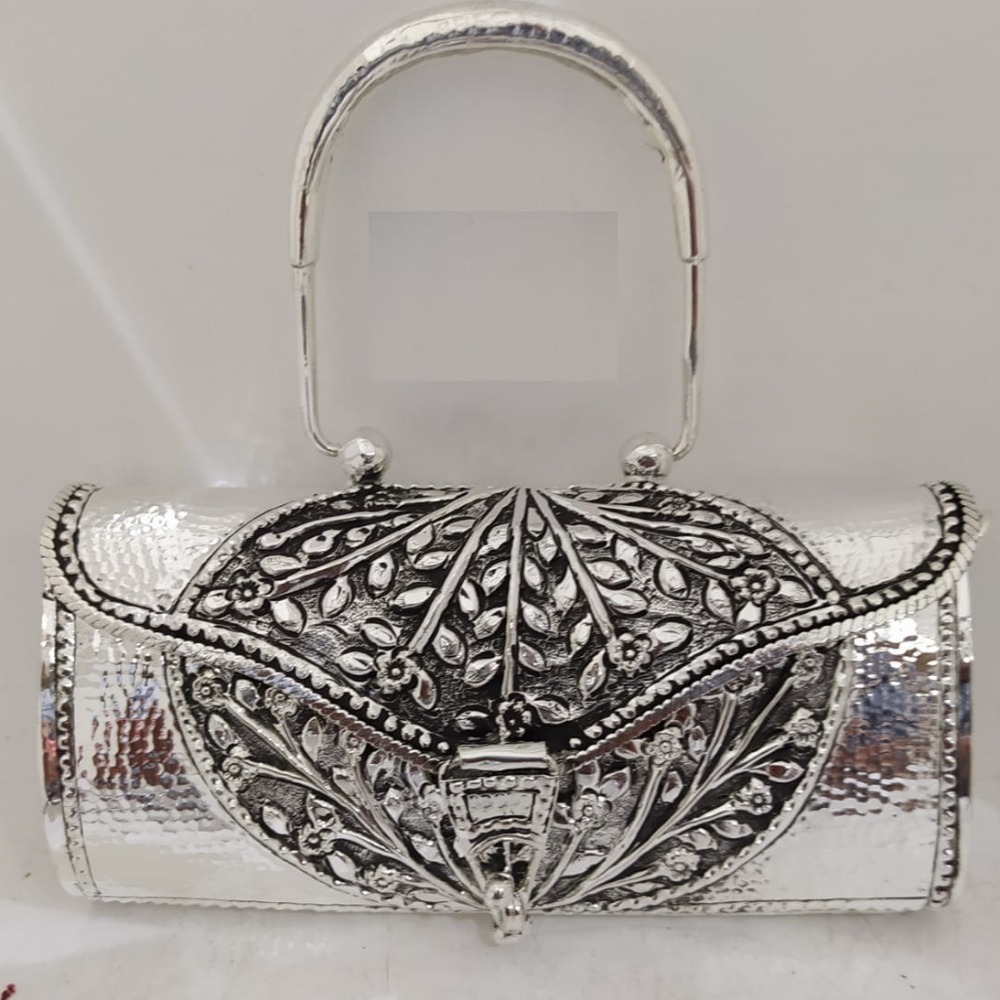 hallmarked silver handbag in snake skin texture.