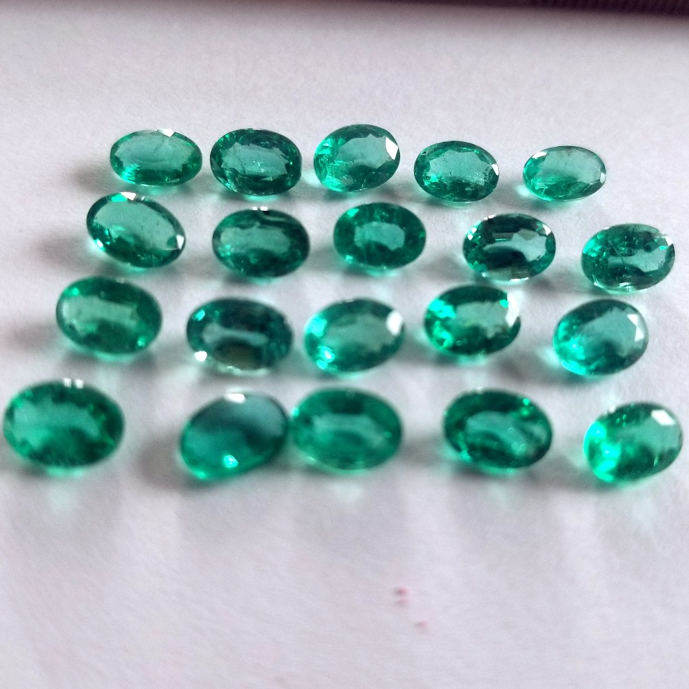 13.95ct oval green emerald-panna