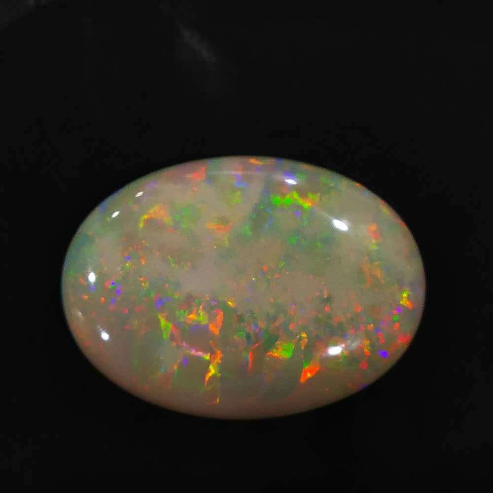 24.25ct oval multicolored opal