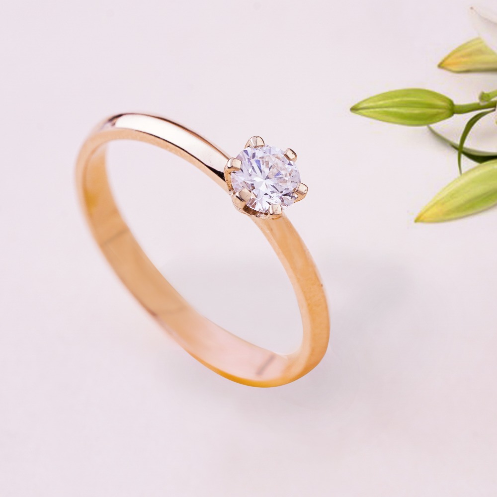 18kt solitaire ring