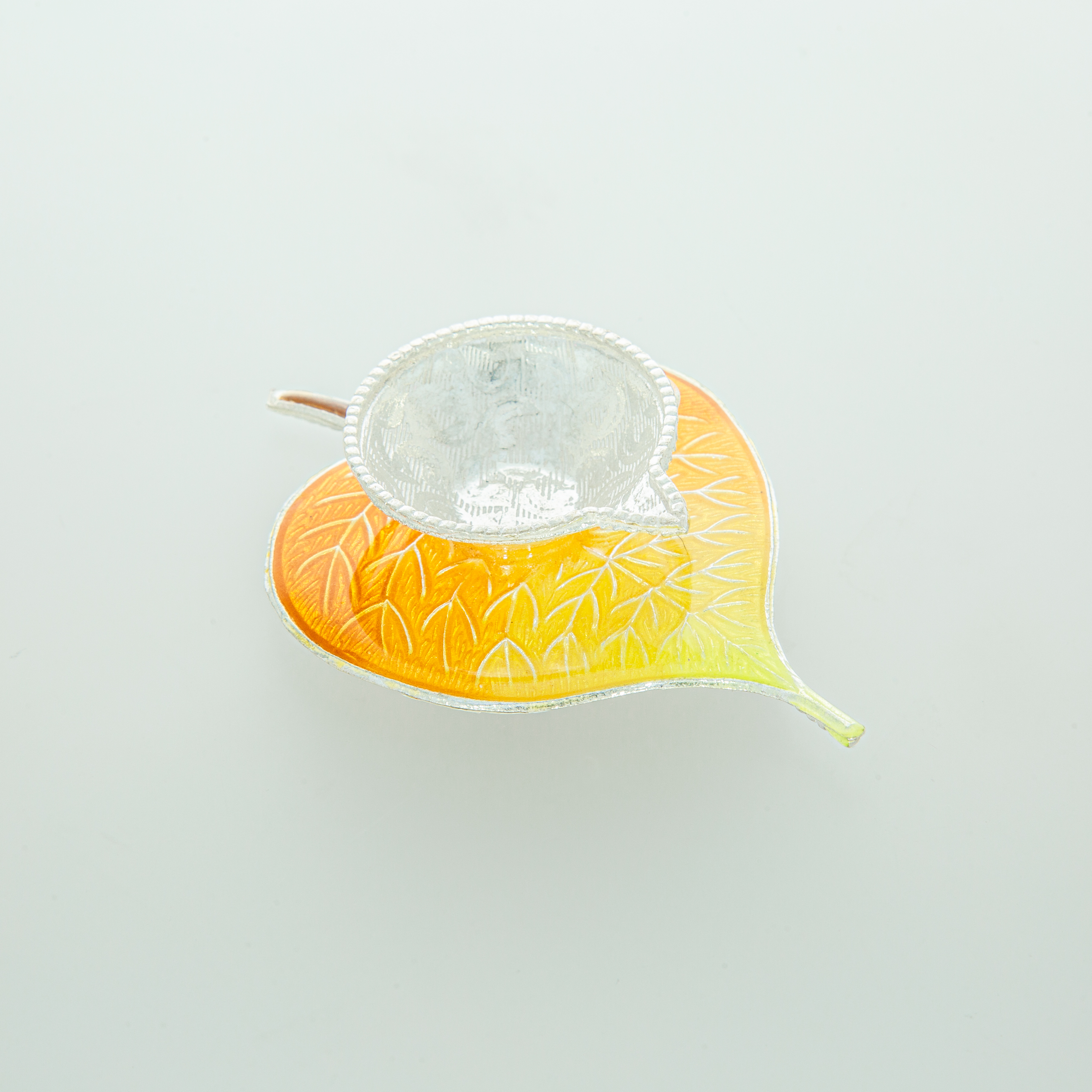 Yellow Color Silver Peepal Oil Lamp