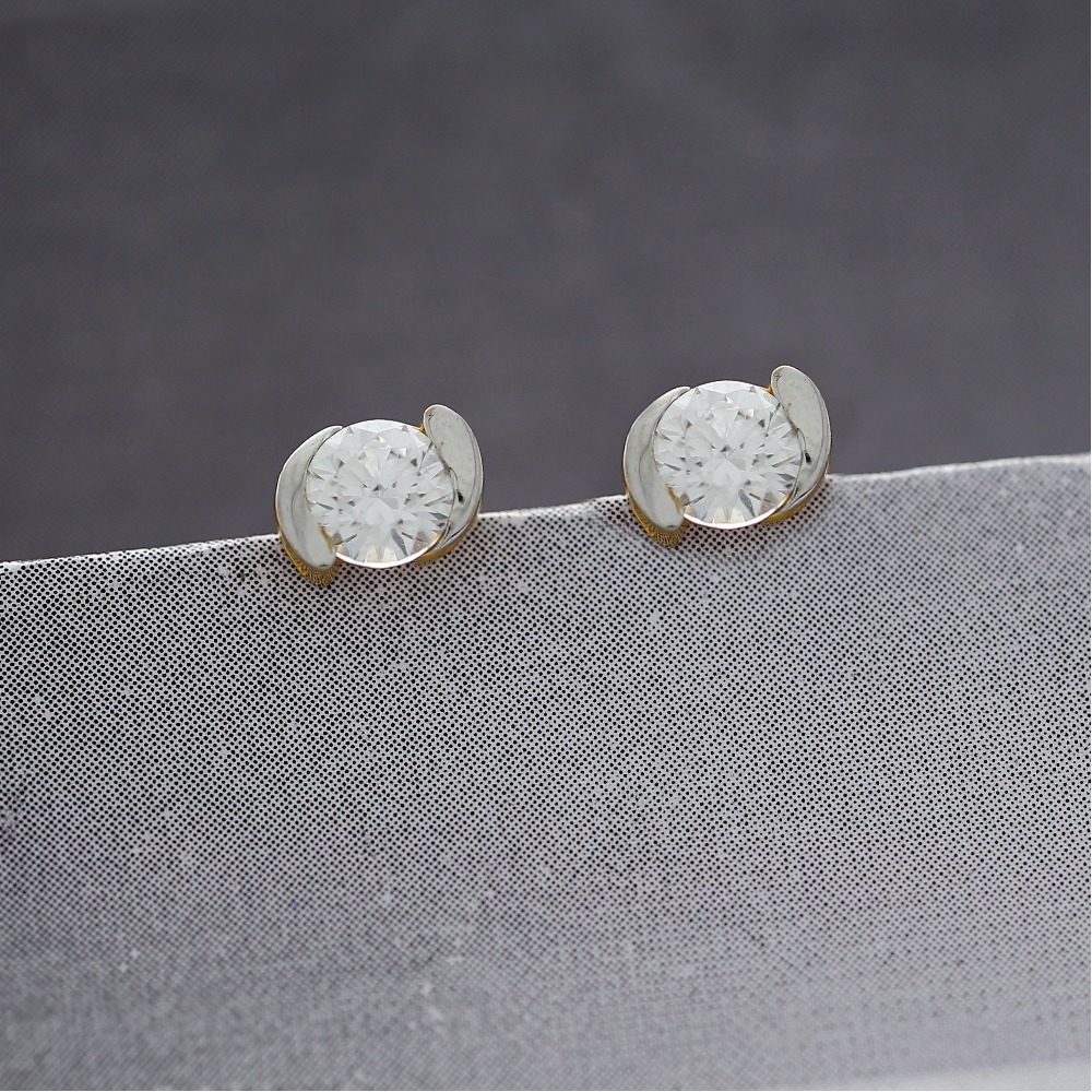 swirling gold studs