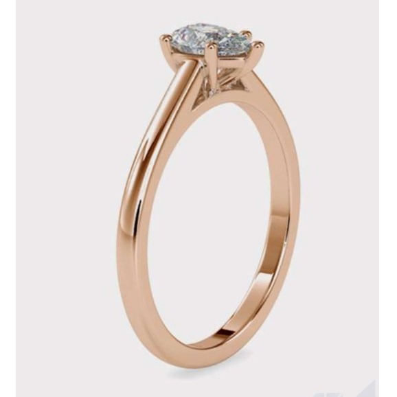 18k gold,rose gold or platinum ring with 0.4 ct. diamond prongs