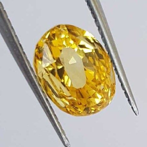 3.40ct oval yellow yellow-sapphire-pukhraj