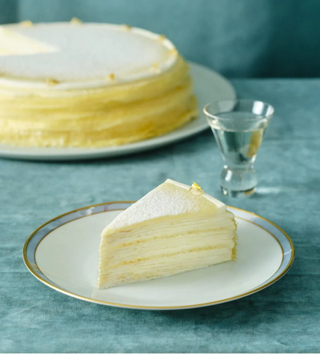 Dassai Blue Mille Crêpes Slice with a glass of Sake