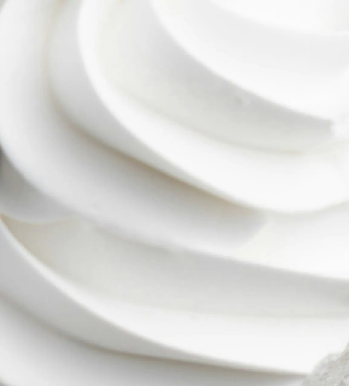 Close-up of Pink Pearl Mille Crêpes showing whipped cream with smooth, swirled texture