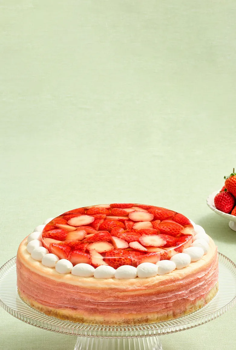 Oishii Omakase Berry Mille Crêpes on a decorative tray with flowers