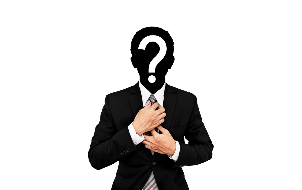 Businessman with question mark