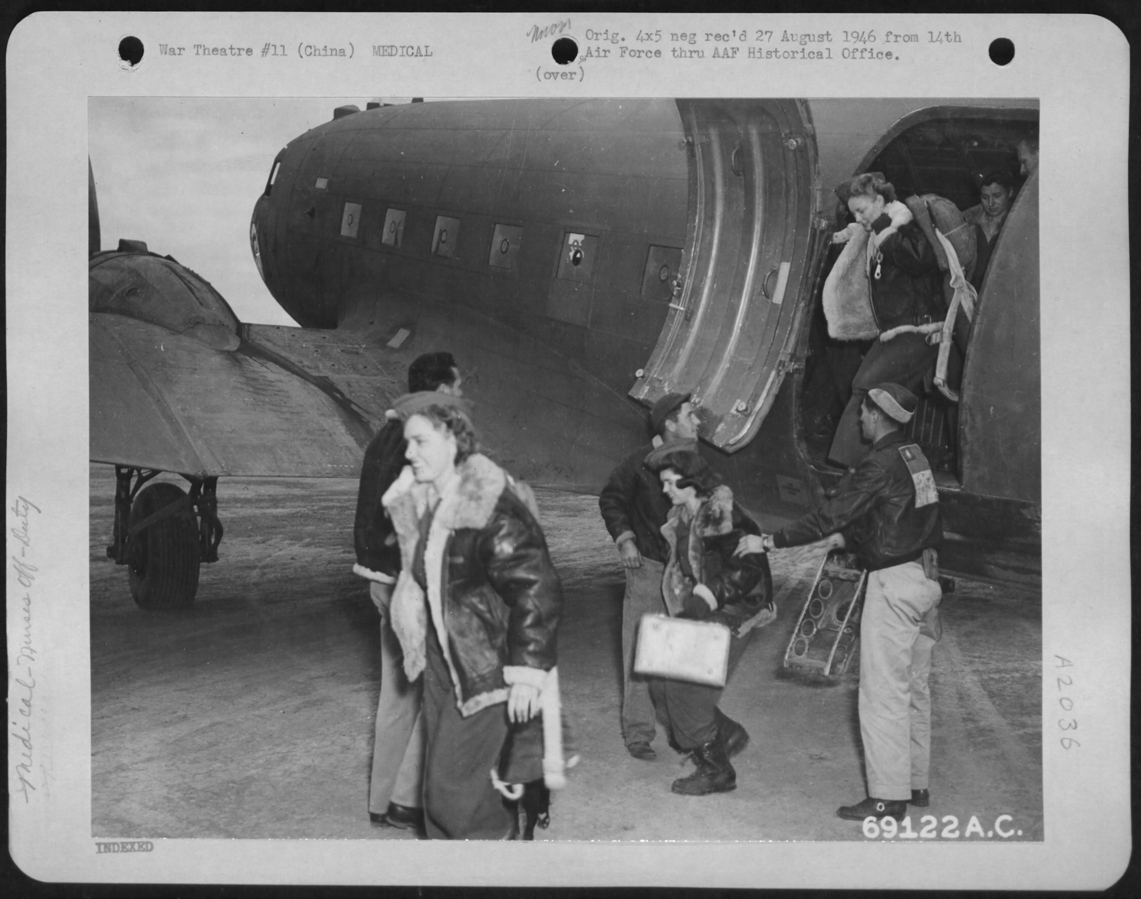 The First Army nurses to arrive In China debark from a Douglas C-47 at a 14th Air Force Base In China