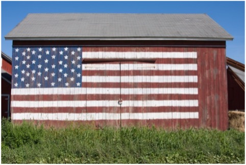 Barn With the American Flag Painted on the Side