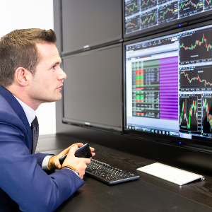Guy Looking at Computers