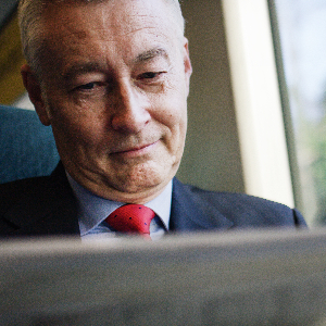 Image of an Investor on a Train