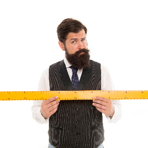 Image of a Man Holding a Ruler