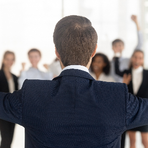Image of a CEO Celebrating With His Employees