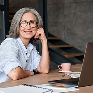 Image of a gray-haired middle-aged investor