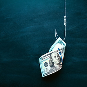 Image of $100 bill being used as bait