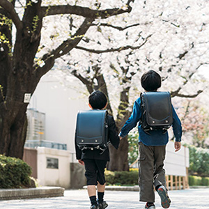 Image of boys heading to school